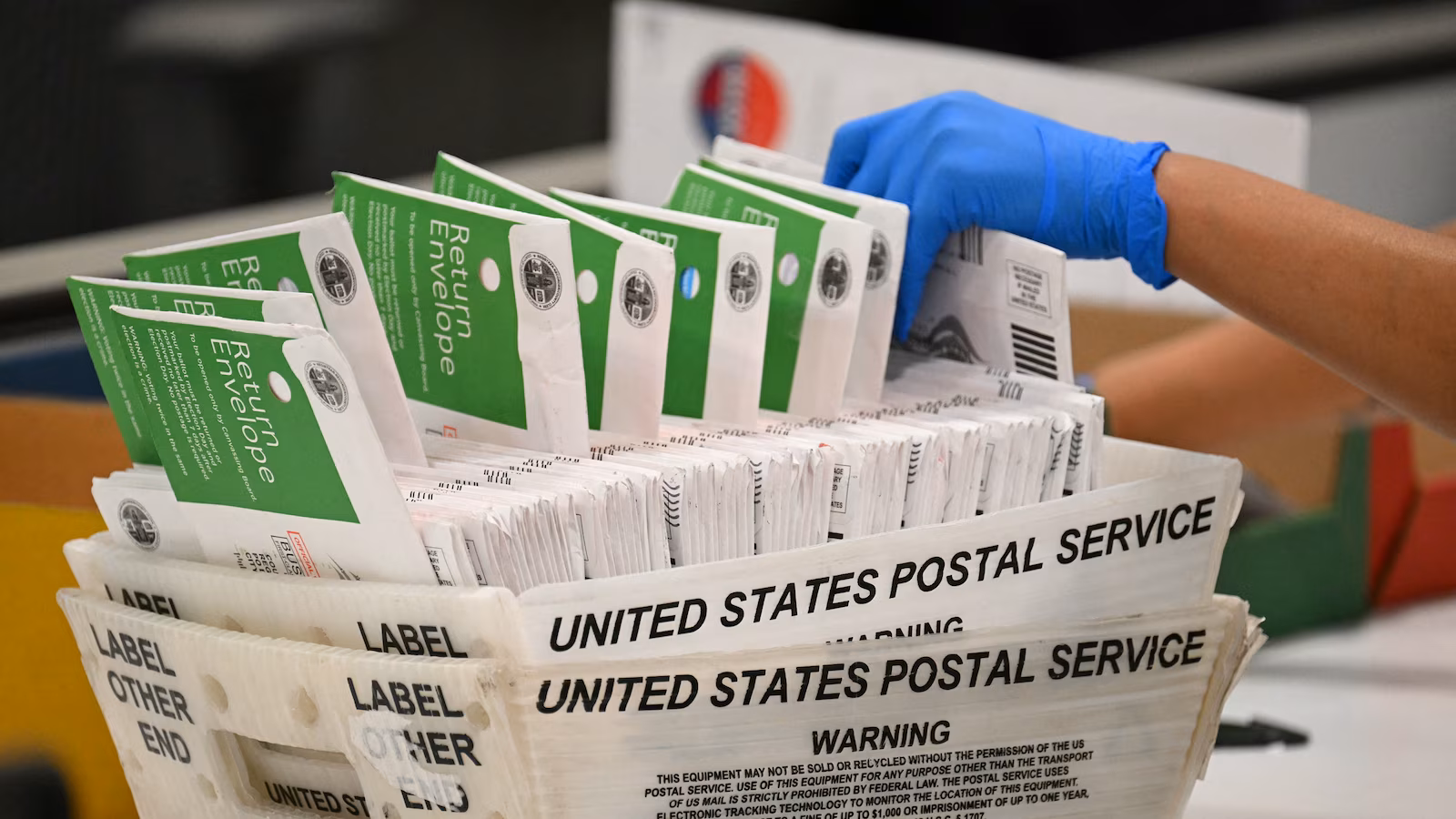 Federal choose briefly blocks Trump administration’s try to limit mail-in voting