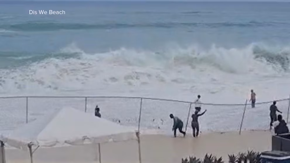 WATCH:  Video reveals lady's terrifying rescue from tough surf within the Bahamas