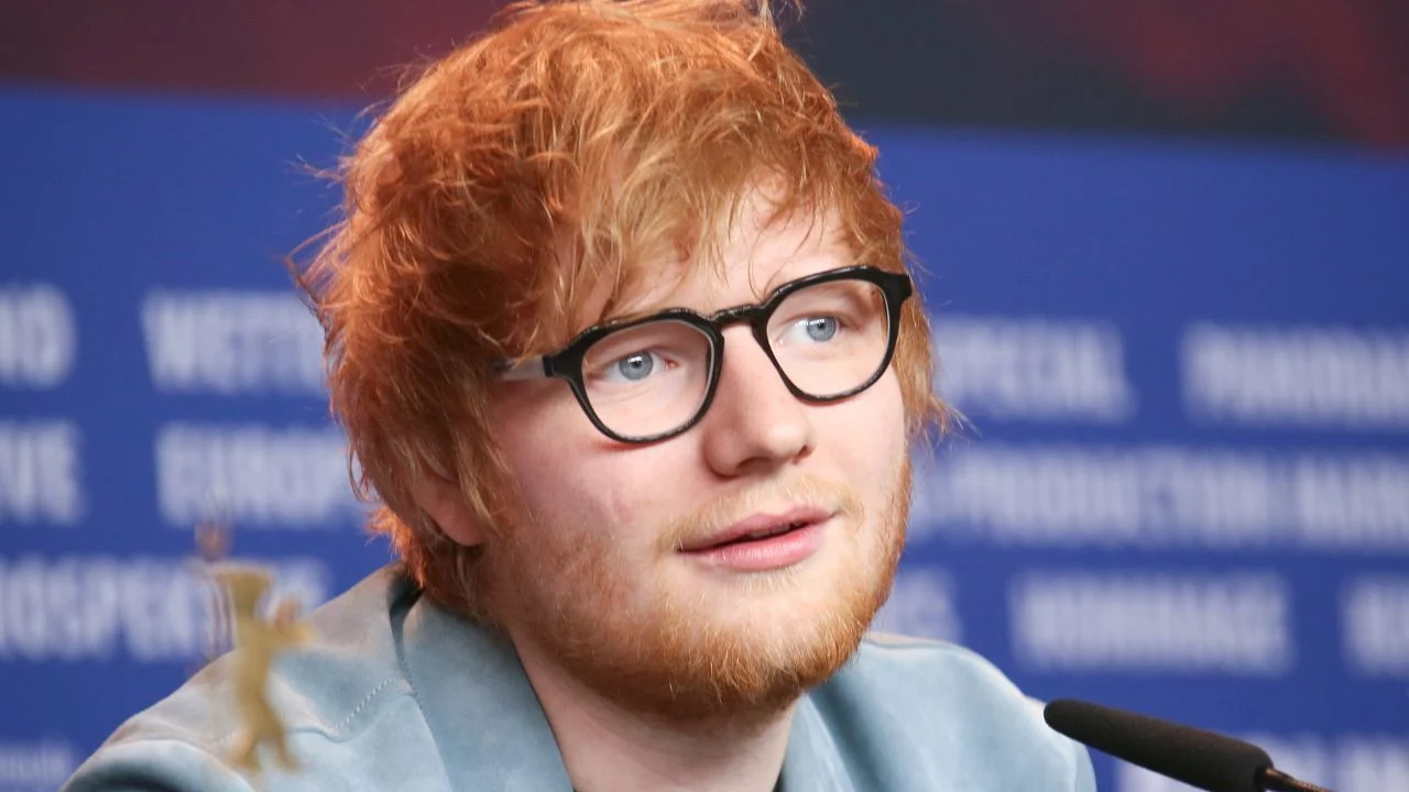 Amelia Dimoldenberg Calls Ed Sheeran a ‘Crimson-Headed Puppet’ in ‘SNL UK’ Monologue